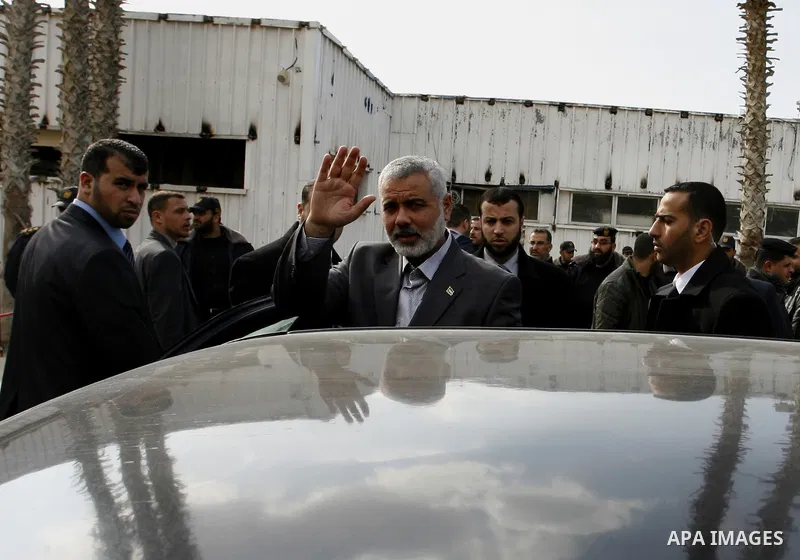 Palestinian Prime Minister in Gaza Strip, Ismail Haniya, arrived to the Rafah border crossing in the southern Gaza Strip on Feb. 20, 2012. during his visits in Egypt to discuss issue a power cut in Gaza strip and the clo...