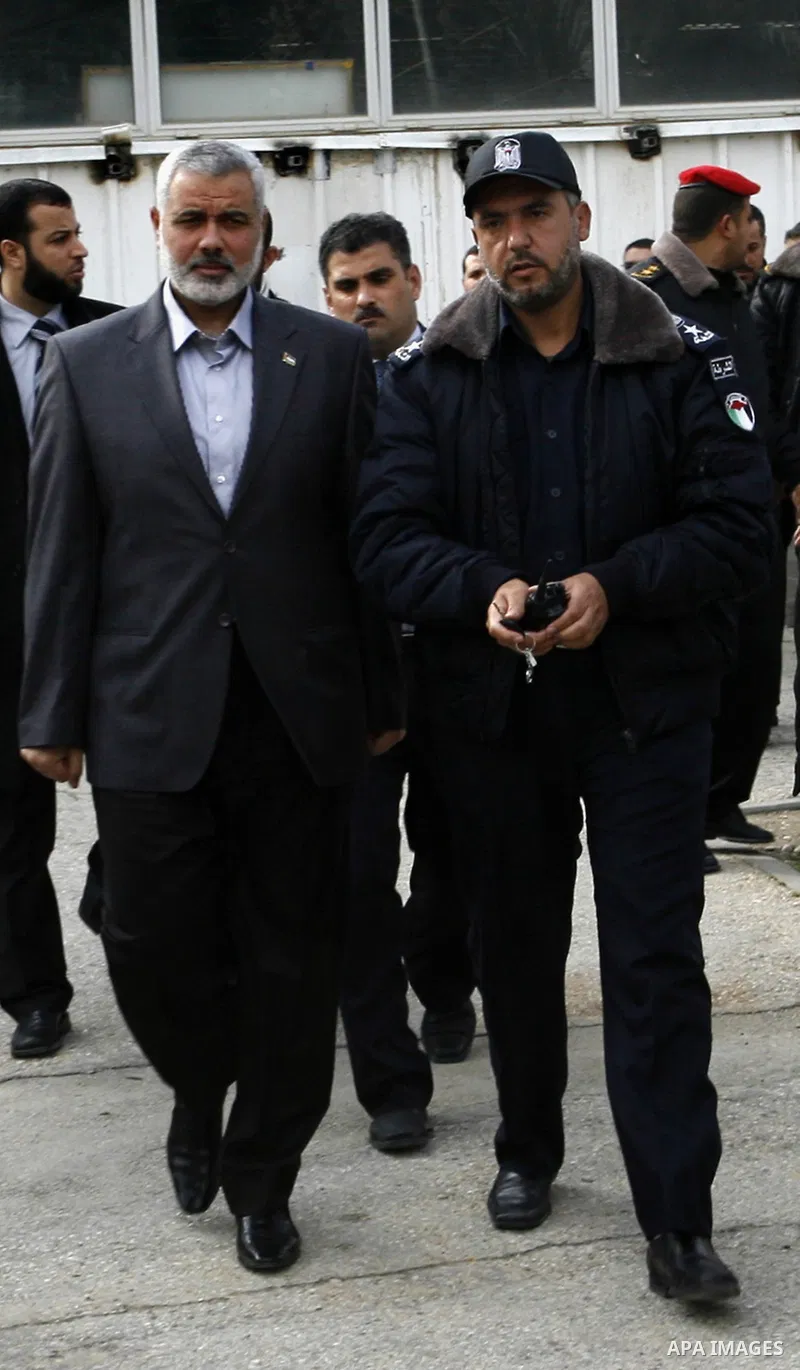 Palestinian Prime Minister in Gaza Strip, Ismail Haniya, arrived to the Rafah border crossing in the southern Gaza Strip on Feb. 20, 2012. during his visits in Egypt to discuss issue a power cut in Gaza strip and the clo...