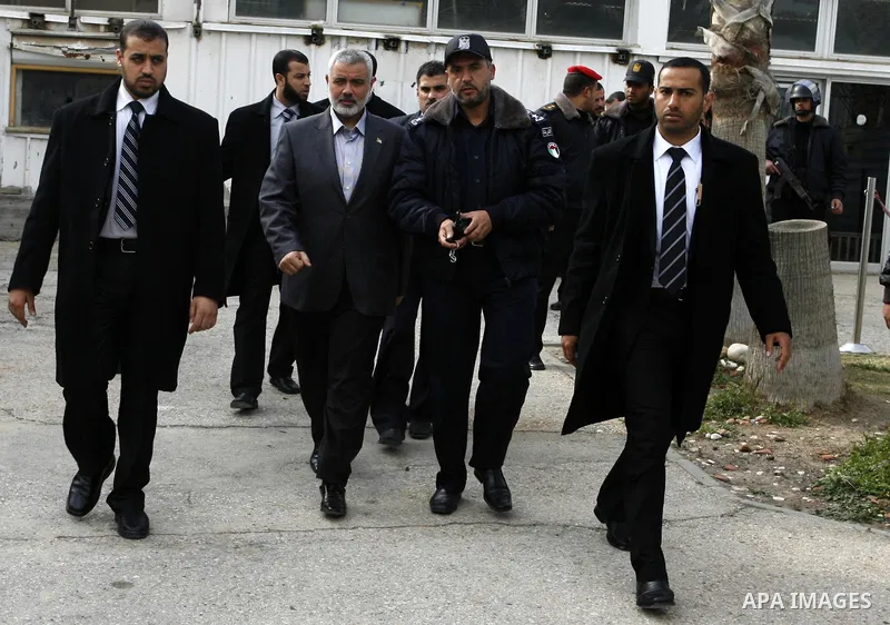 Palestinian Prime Minister in Gaza Strip, Ismail Haniya, arrived to the Rafah border crossing in the southern Gaza Strip on Feb. 20, 2012. during his visits in Egypt to discuss issue a power cut in Gaza strip and the clo...