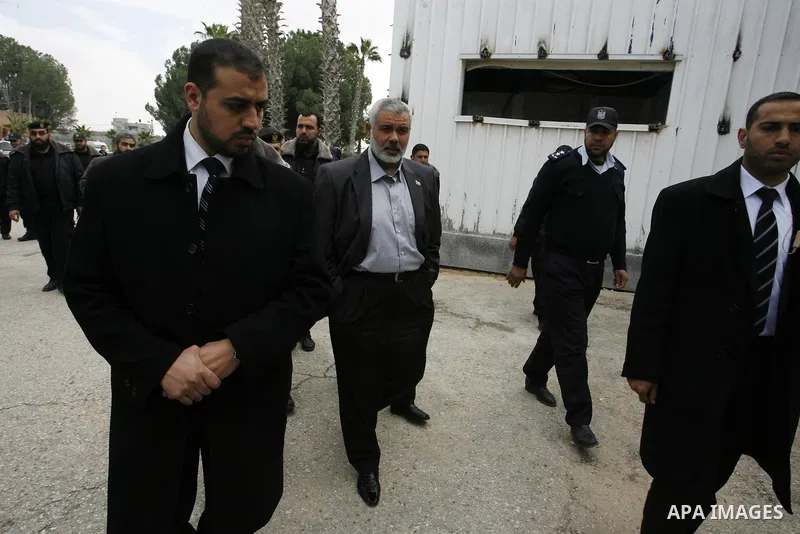 Palestinian Prime Minister in Gaza Strip, Ismail Haniya, arrived to the Rafah border crossing in the southern Gaza Strip on Feb. 20, 2012. during his visits in Egypt to discuss issue a power cut in Gaza strip and the clo...