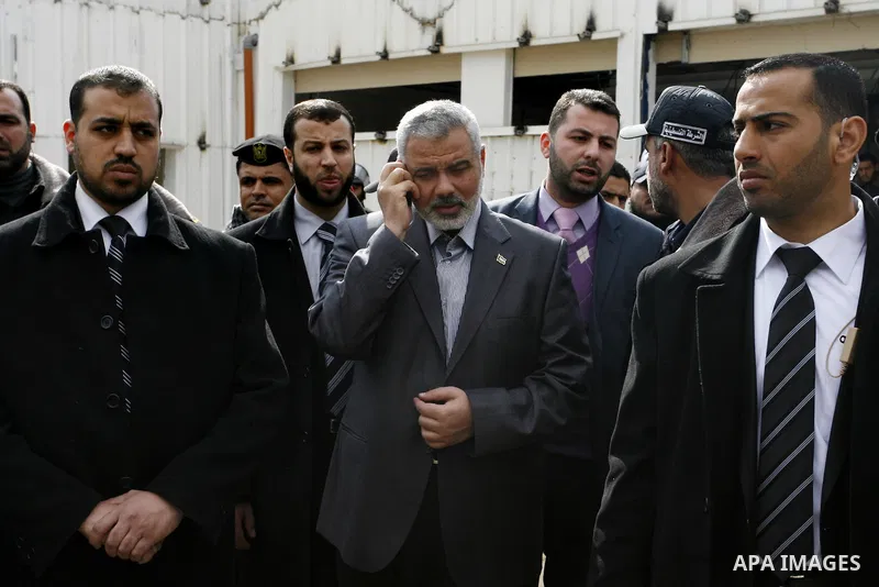 Palestinian Prime Minister in Gaza Strip, Ismail Haniya, arrived to the Rafah border crossing in the southern Gaza Strip on Feb. 20, 2012. during his visits in Egypt to discuss issue a power cut in Gaza strip and the clo...