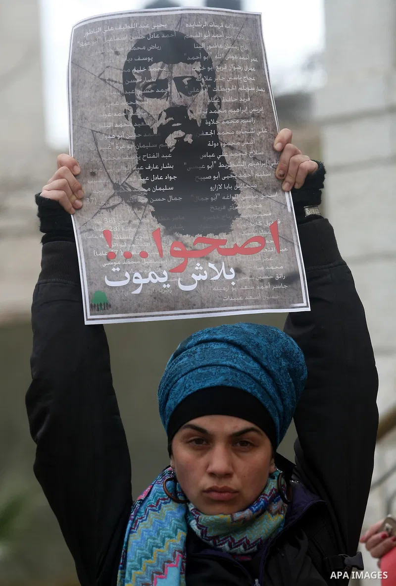Palestinians participates in a protest in solidarity with Khader Adnan, 33, a senior member of Islamic Jihad jailed in Israel who has been on hunger strike for 65 days, and calling for the release of Palestinian prisoner...