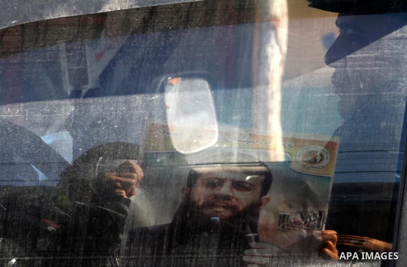 Palestinian supporters of the Islamic Jihad militant group participate in a protest in solidarity with Khader Adnan, a senior member of Islamic Jihad jailed in Israel who has been on hunger strike for 66 days, in Gaza Ci...