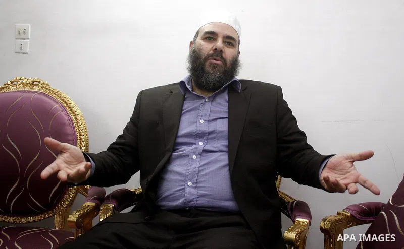 Egyptian Tareq al-Zomor, a member of Egypt's Islamic Jihad, speaks to media at his house in Cairo on Feb. 20, 2012. Al-Zomor, who jailed over the 1981 assassination of president Anwar Sadat, was released from Egyptian pr...