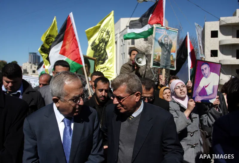 Palestinian Prime Minister Salam Fayyad, attends a protest in support of Islamic Jihad member Khader Adnan outside Ofer prison near the West Bank city of Ramallah February 21, 2012. Adnan, held without trial by Israel, a...