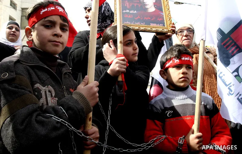 Palestinians participate in a demonstration calling for the release of Palestinian prisoners jailed in Israel, in the West Bank city of Nablus, Wednesday,Feb. 22, 2012. Photo by Wagdi Eshtayah