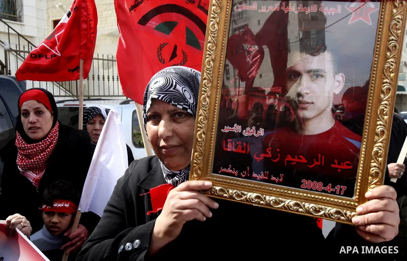 Palestinians participate in a demonstration calling for the release of Palestinian prisoners jailed in Israel, in the West Bank city of Nablus, Wednesday,Feb. 22, 2012. Photo by Wagdi Eshtayah