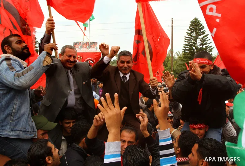 Supporters of the Democratic Front for the Liberation of Palestine (DFLP) shout slogans during a rally marking the 43rd anniversary of the movement's establishment in Gaza City on February 23, 2012. Photo by Ashraf Amra