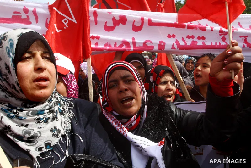 Supporters of the Democratic Front for the Liberation of Palestine (DFLP) shout slogans during a rally marking the 43rd anniversary of the movement's establishment in Gaza City on February 23, 2012. Photo by Ashraf Amra