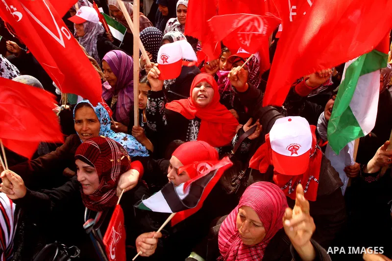 Supporters of the Democratic Front for the Liberation of Palestine (DFLP) shout slogans during a rally marking the 43rd anniversary of the movement's establishment in Gaza City on February 23, 2012. Photo by Ashraf Amra