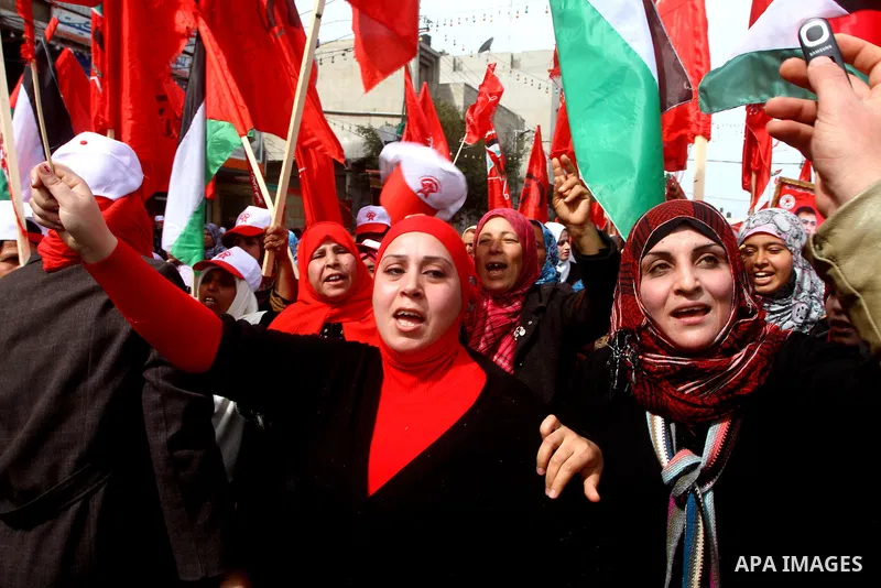 Supporters of the Democratic Front for the Liberation of Palestine (DFLP) shout slogans during a rally marking the 43rd anniversary of the movement's establishment in Gaza City on February 23, 2012. Photo by Ashraf Amra