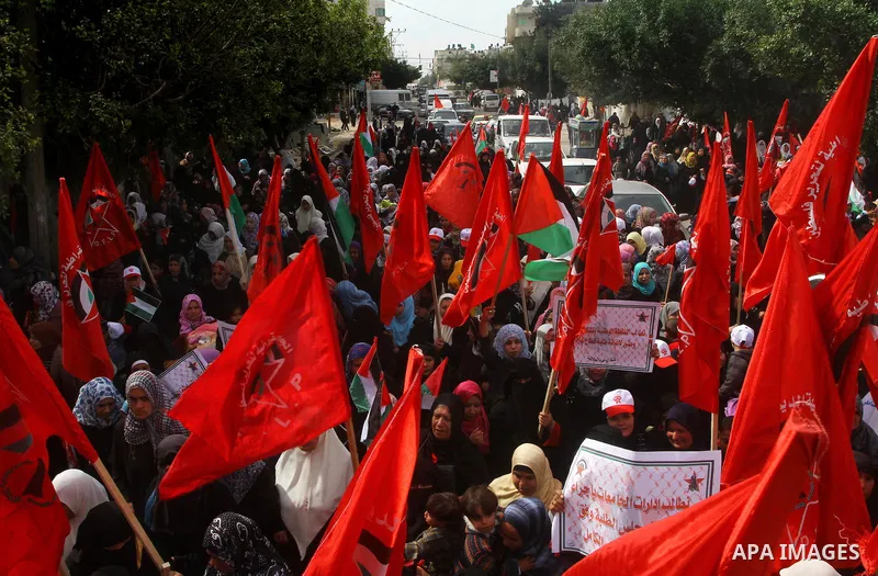 Supporters of the Democratic Front for the Liberation of Palestine (DFLP) shout slogans during a rally marking the 43rd anniversary of the movement's establishment in Gaza City on February 23, 2012. Photo by Ashraf Amra