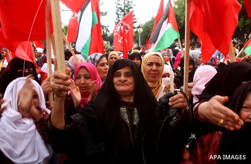 Supporters of the Democratic Front for the Liberation of Palestine (DFLP) shout slogans during a rally marking the 43rd anniversary of the movement's establishment in Gaza City on February 23, 2012. Photo by Ashraf Amra