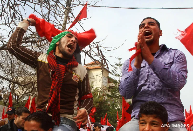 Supporters of the Democratic Front for the Liberation of Palestine (DFLP) shout slogans during a rally marking the 43rd anniversary of the movement's establishment in Gaza City on February 23, 2012. Photo by Ashraf Amra