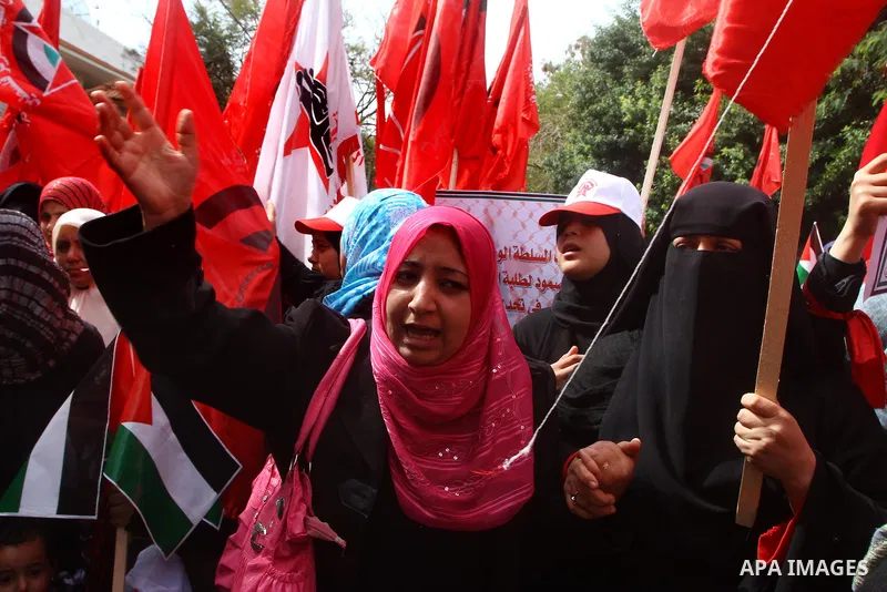 Supporters of the Democratic Front for the Liberation of Palestine (DFLP) shout slogans during a rally marking the 43rd anniversary of the movement's establishment in Gaza City on February 23, 2012. Photo by Ashraf Amra