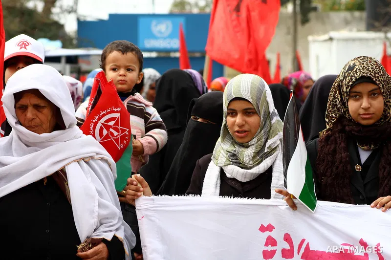 Supporters of the Democratic Front for the Liberation of Palestine (DFLP) shout slogans during a rally marking the 43rd anniversary of the movement's establishment in Gaza City on February 23, 2012. Photo by Ashraf Amra