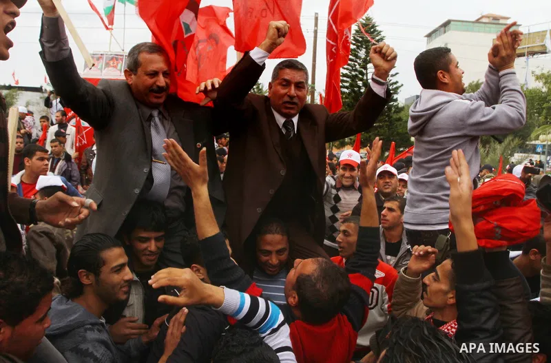 Supporters of the Democratic Front for the Liberation of Palestine (DFLP) shout slogans during a rally marking the 43rd anniversary of the movement's establishment in Gaza City on February 23, 2012. Photo by Ashraf Amra