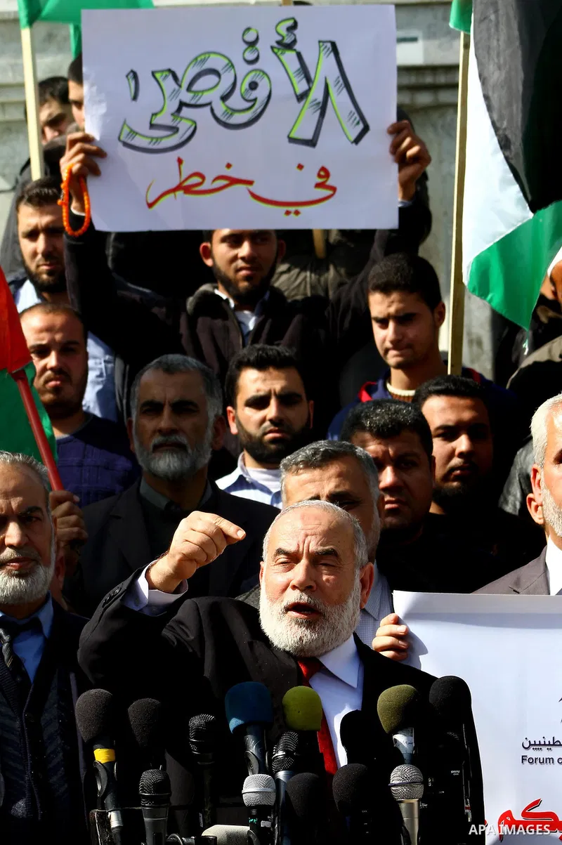 The spokesman of Hamas Parliament, Ahmed Bahar delivers speech during a press conference in a demonstration in Gaza City on February 23, 2012 against the arrest of three Palestinians in Jerusalem's old city that houses t...