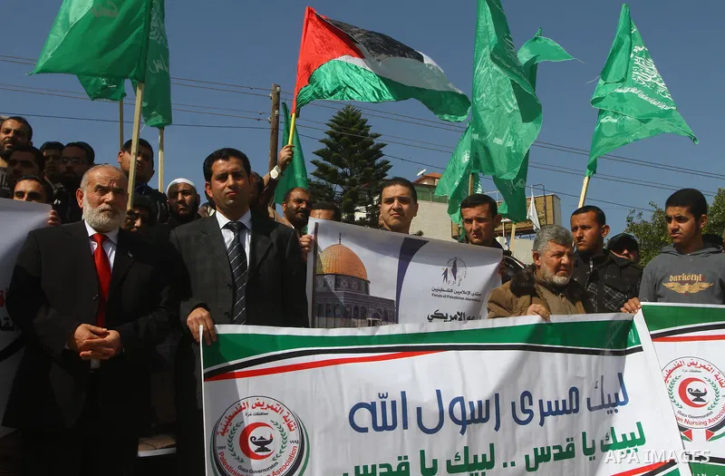Palestinian protesters shout slogans during a demonstration in Gaza City on February 23, 2012 against the arrest of three Palestinians in Jerusalem's old city that houses the Al-Aqsa mosque compound after confrontations...