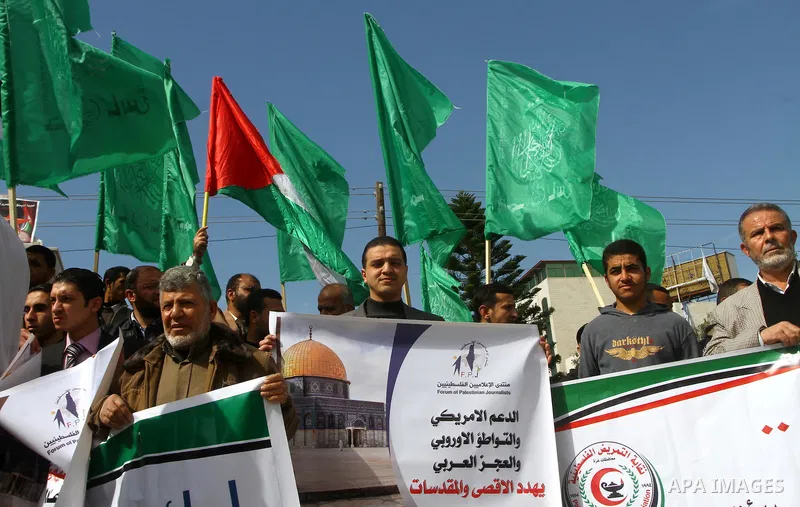 Palestinian protesters shout slogans during a demonstration in Gaza City on February 23, 2012 against the arrest of three Palestinians in Jerusalem's old city that houses the Al-Aqsa mosque compound after confrontations...