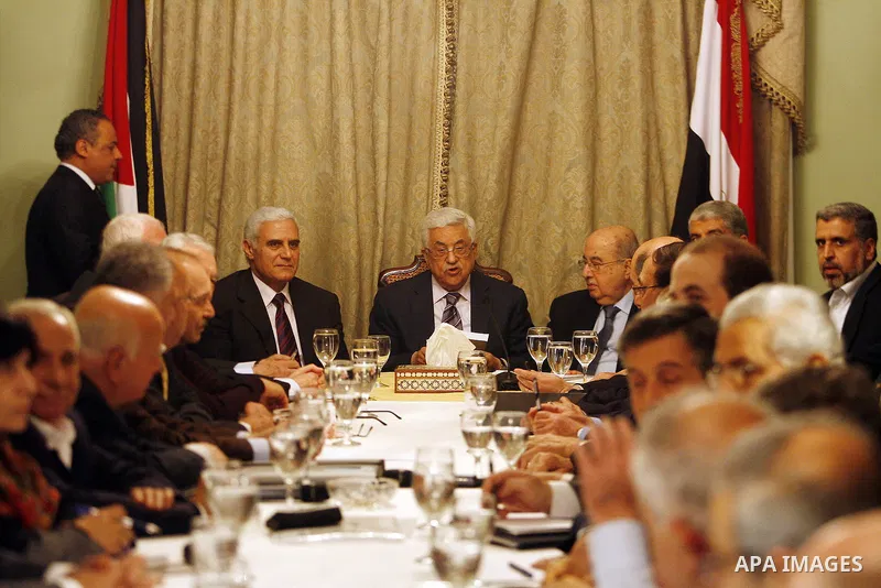 Egyptian intelligence chief Murad Muwafi, Palestinian President Mahmoud Abbas, and Hamas leader Khaled Meshaal, during a meeting between Fatah and Hamas in Cairo, Egypt, 23 February 2012. According to media reports, the...