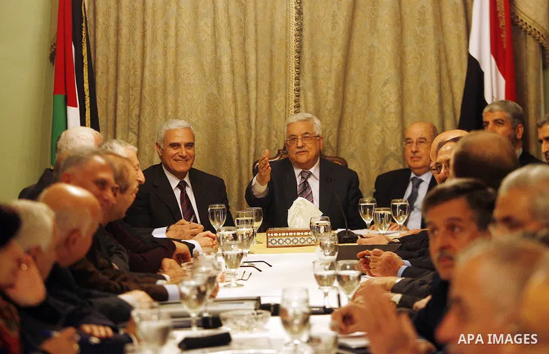 Egyptian intelligence chief Murad Muwafi, Palestinian President Mahmoud Abbas, and Hamas leader Khaled Meshaal, during a meeting between Fatah and Hamas in Cairo, Egypt, 23 February 2012. According to media reports, the...