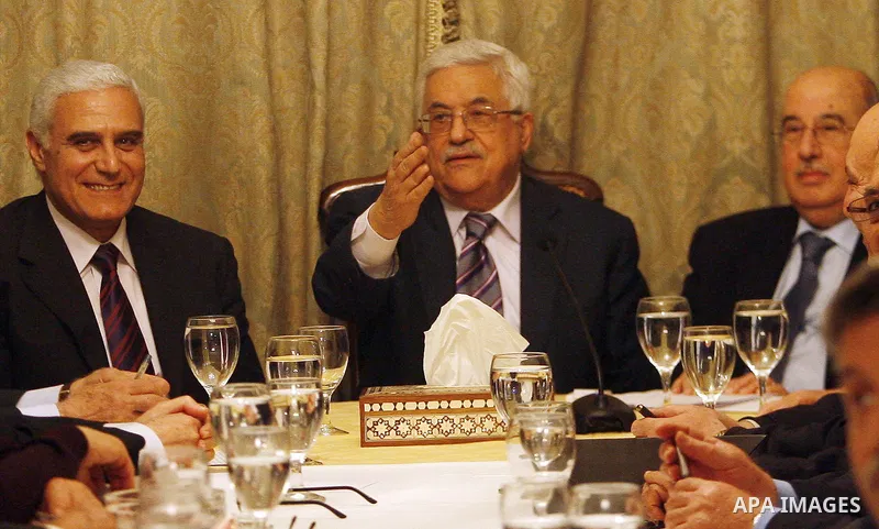 Egyptian intelligence chief Murad Muwafi, Palestinian President Mahmoud Abbas, and Hamas leader Khaled Meshaal, during a meeting between Fatah and Hamas in Cairo, Egypt, 23 February 2012. According to media reports, the...