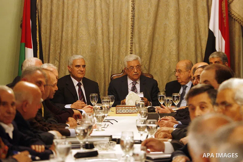 Egyptian intelligence chief Murad Muwafi, Palestinian President Mahmoud Abbas, and Hamas leader Khaled Meshaal, during a meeting between Fatah and Hamas in Cairo, Egypt, 23 February 2012. According to media reports, the...