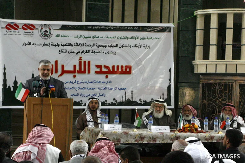 Palestinian legislative council members and members of Kuwaiti delegation attend the opening ceremony of al-Abrar mosque, which was destroyed during the Israeli war on Gaza Strip in 2008-2009, in the southern Gaza Strip...