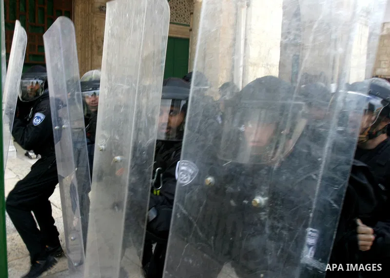 Israeli policemen stand guard during clashes with Palestinian protesters on the compound known to Muslims as the Noble Sanctuary and to Jews as the Temple Mount in Jerusalem's Old City February 24, 2012. Israeli policeme...