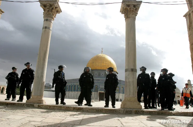 Israeli policemen stand guard during clashes with Palestinian protesters on the compound known to Muslims as the Noble Sanctuary and to Jews as the Temple Mount in Jerusalem's Old City February 24, 2012. Israeli policeme...