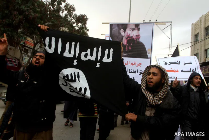 Palestinian Salafists take part in a protest against Syria's President Bashar al-Assad in Rafah in the southern Gaza Strip February 24, 2012. The black flag reads "There is no god but Allah and Mohammad is the prophet"....