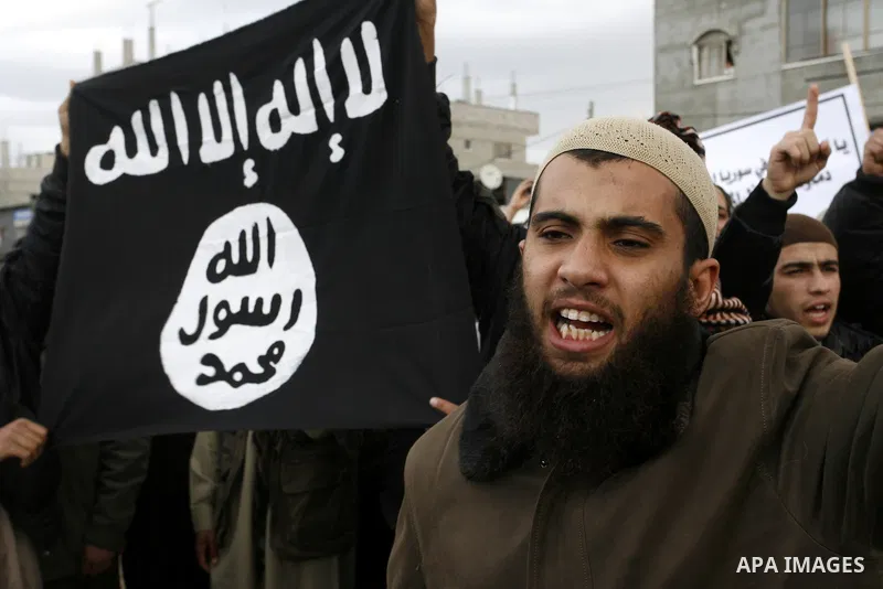 Palestinian Salafists take part in a protest against Syria's President Bashar al-Assad in Rafah in the southern Gaza Strip February 24, 2012. The black flag reads "There is no god but Allah and Mohammad is the prophet"....