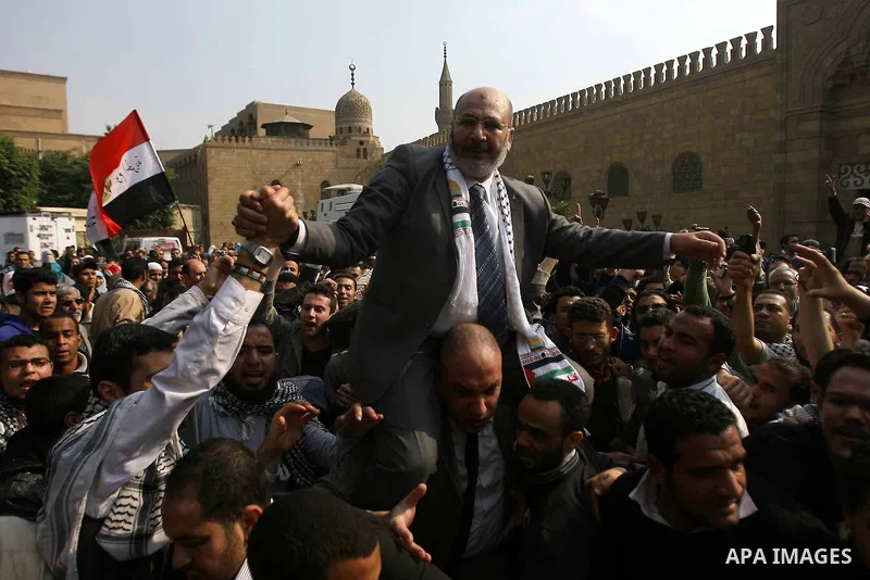 Egyptian Muslim cleric Safwat Hegazi greets worshippers outside Al-Azhar mosque, during a gathering to support Palestinian people in Cairo, Egypt, 24 February 2012. According to media reports, Haniyeh joined hundreds of...