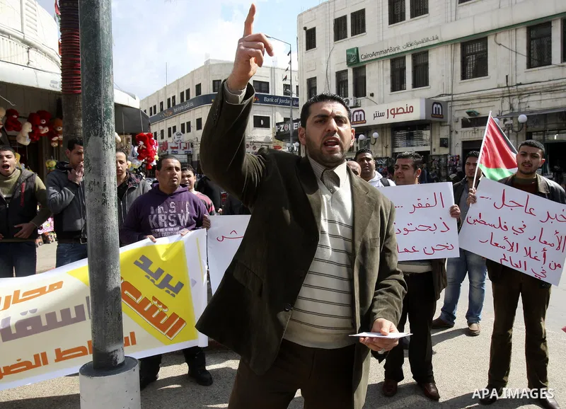 Palestinians participate protest against rising prices and taxes in the city of Nablus West Bank, Saturday, Feb. 25, 2012. Photo by Wagdi Eshtayah