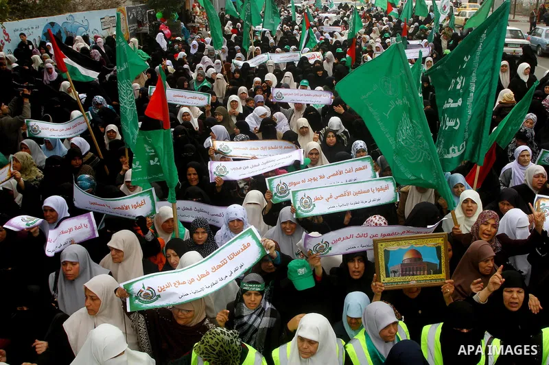 Palestinian women gather as they protest in Gaza City on February 26, 2012, two days following violence in the flashpoint Al-Aqsa mosque compound in Jerusalem's Old City, between Israeli forces and Palestinians. The unre...