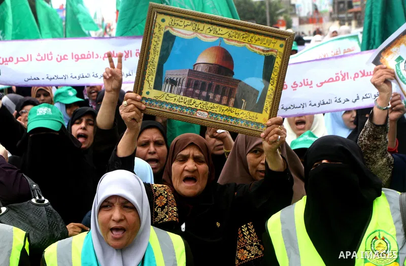 Palestinian women gather as they protest in Gaza City on February 26, 2012, two days following violence in the flashpoint Al-Aqsa mosque compound in Jerusalem's Old City, between Israeli forces and Palestinians. The unre...