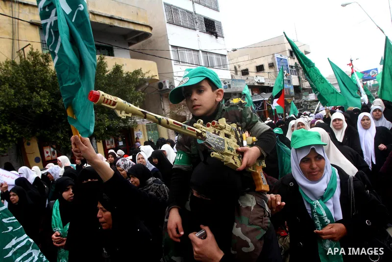 Palestinian women gather as they protest in Gaza City on February 26, 2012, two days following violence in the flashpoint Al-Aqsa mosque compound in Jerusalem's Old City, between Israeli forces and Palestinians. The unre...