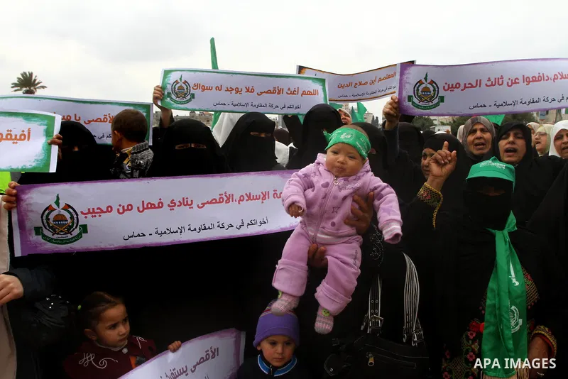 Palestinian women gather as they protest in Gaza City on February 26, 2012, two days following violence in the flashpoint Al-Aqsa mosque compound in Jerusalem's Old City, between Israeli forces and Palestinians. The unre...