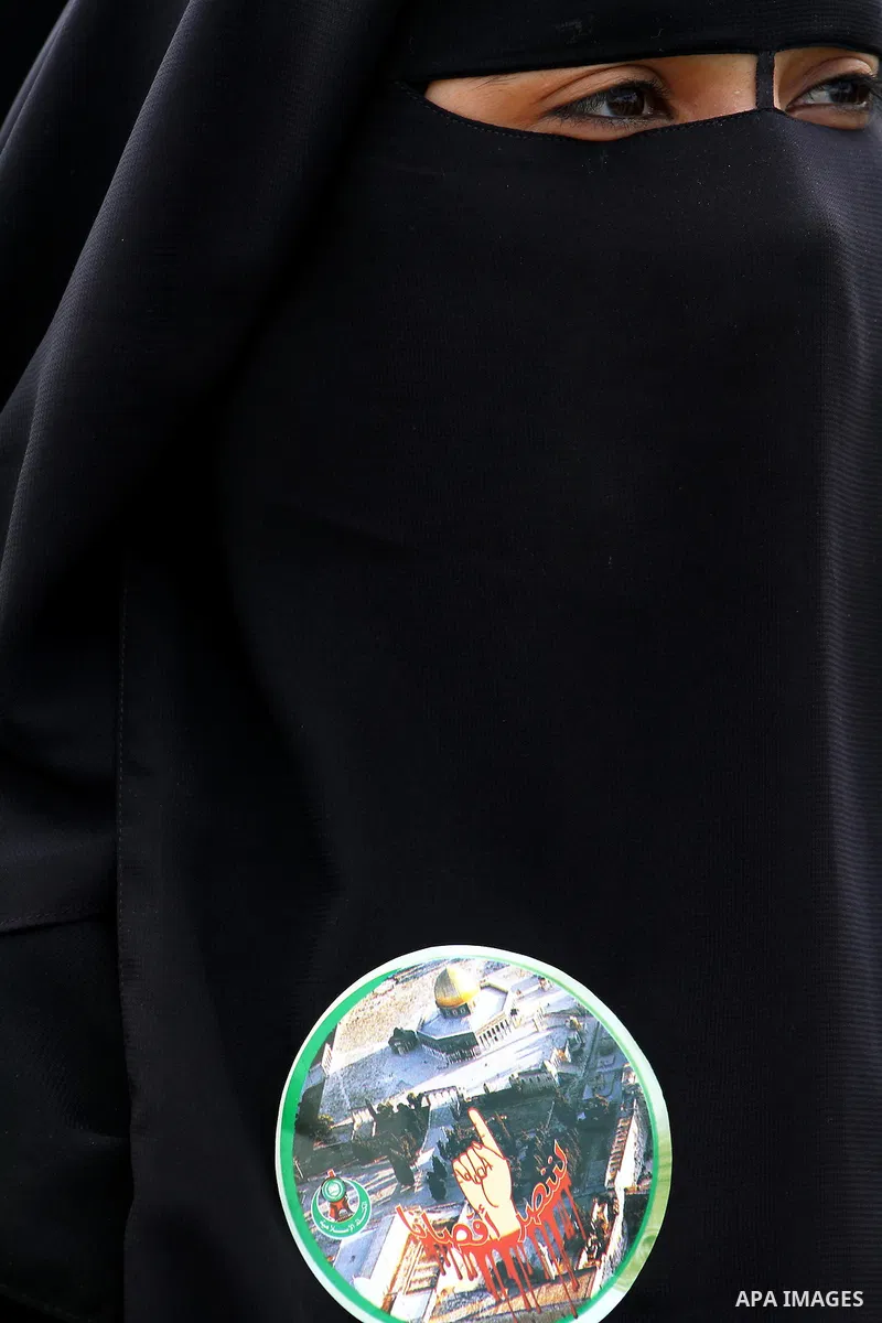 Palestinian women gather as they protest in Gaza City on February 26, 2012, two days following violence in the flashpoint Al-Aqsa mosque compound in Jerusalem's Old City, between Israeli forces and Palestinians. The unre...
