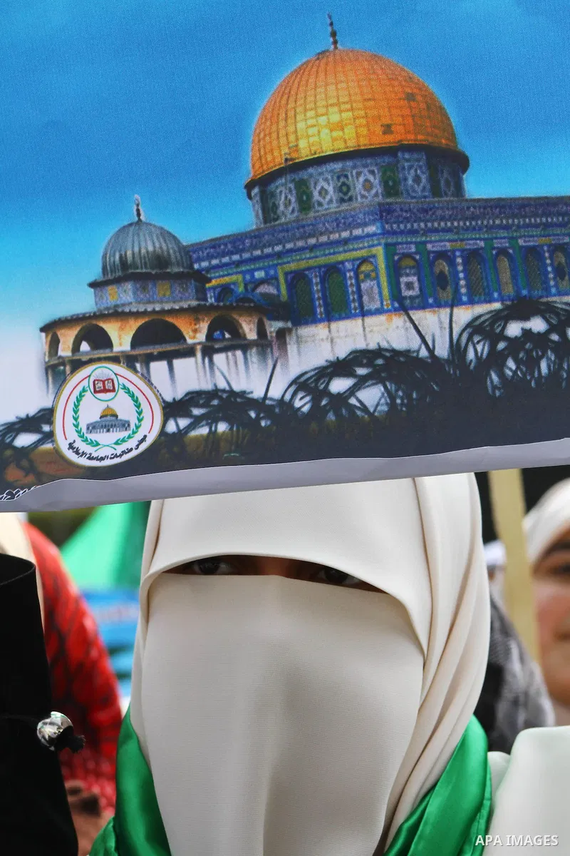Palestinian women gather as they protest in Gaza City on February 26, 2012, two days following violence in the flashpoint Al-Aqsa mosque compound in Jerusalem's Old City, between Israeli forces and Palestinians. The unre...