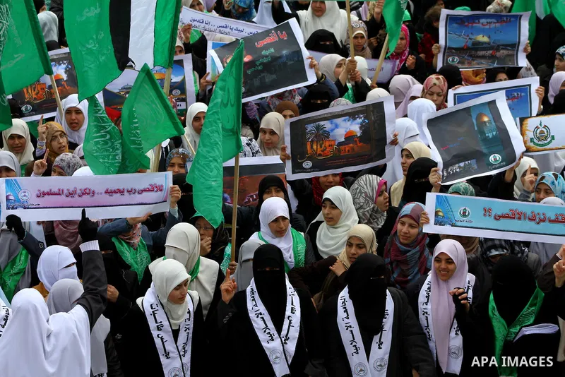 Palestinian women gather as they protest in Gaza City on February 26, 2012, two days following violence in the flashpoint Al-Aqsa mosque compound in Jerusalem's Old City, between Israeli forces and Palestinians. The unre...