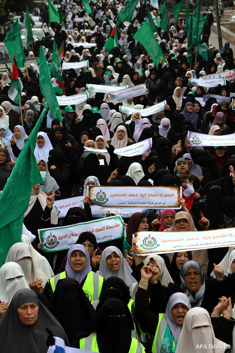 Palestinian women gather as they protest in Gaza City on February 26, 2012, two days following violence in the flashpoint Al-Aqsa mosque compound in Jerusalem's Old City, between Israeli forces and Palestinians. The unre...