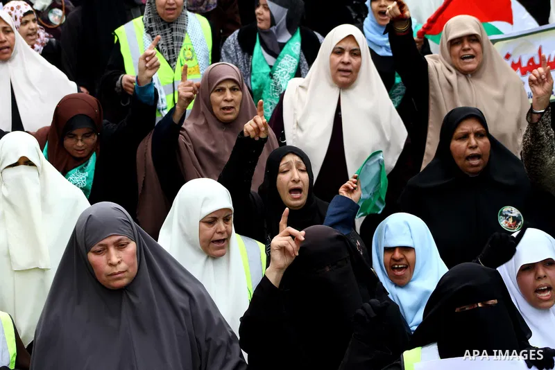 Palestinian women gather as they protest in Gaza City on February 26, 2012, two days following violence in the flashpoint Al-Aqsa mosque compound in Jerusalem's Old City, between Israeli forces and Palestinians. The unre...
