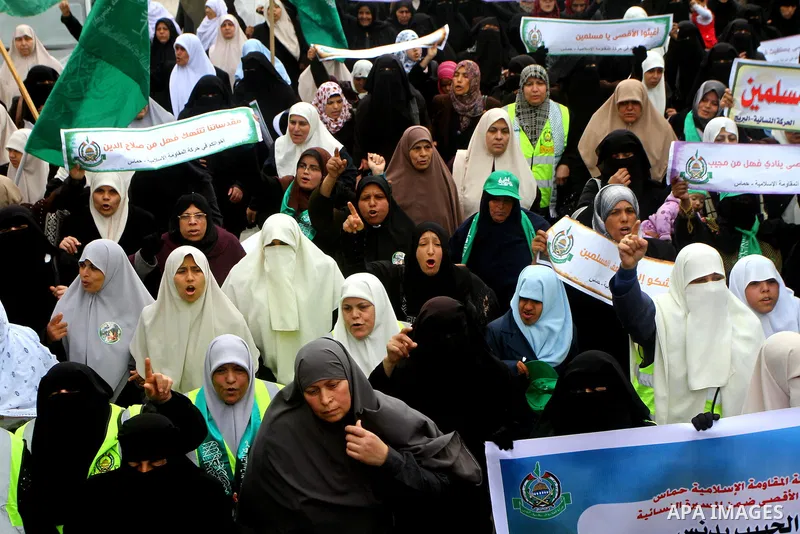 Palestinian women gather as they protest in Gaza City on February 26, 2012, two days following violence in the flashpoint Al-Aqsa mosque compound in Jerusalem's Old City, between Israeli forces and Palestinians. The unre...
