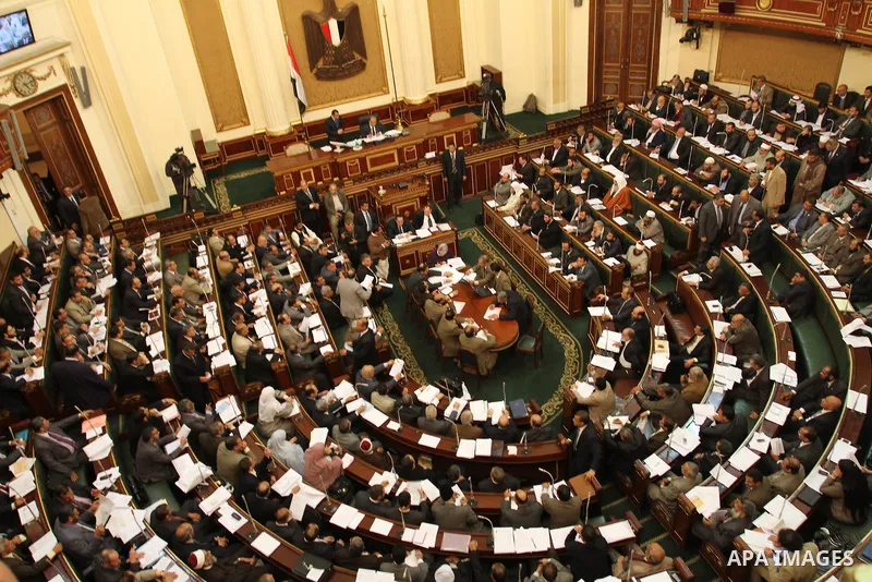 Egypt's army-appointed Prime Minister Kamal al-Ganzouri speaks during a parliament session in Cairo February 26, 2012. Egypt's military rulers invited the parliament's two houses to convene on Saturday to elect an assemb...