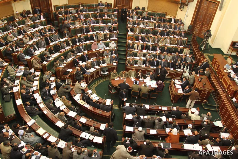 Egypt's army-appointed Prime Minister Kamal al-Ganzouri speaks during a parliament session in Cairo February 26, 2012. Egypt's military rulers invited the parliament's two houses to convene on Saturday to elect an assemb...
