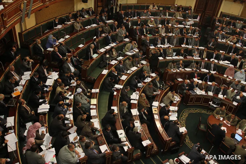 Egypt's army-appointed Prime Minister Kamal al-Ganzouri speaks during a parliament session in Cairo February 26, 2012. Egypt's military rulers invited the parliament's two houses to convene on Saturday to elect an assemb...