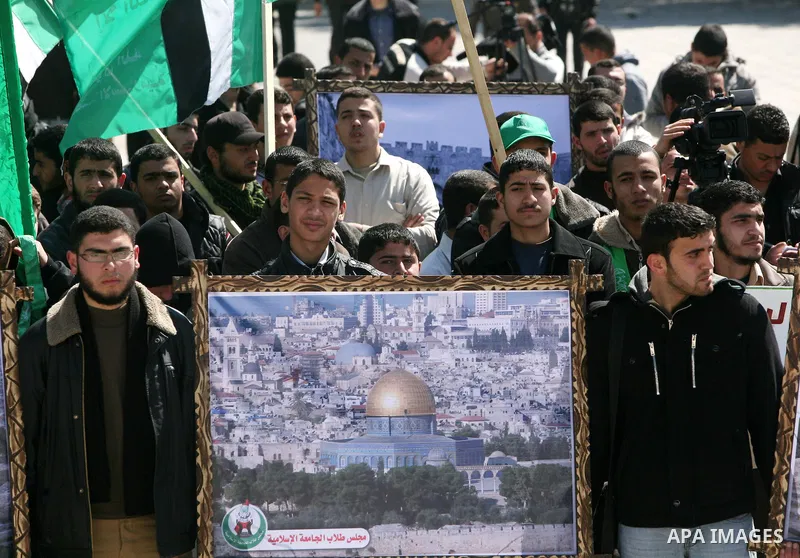 Palestinian students gather as they protest in Gaza City on February 27, 2012, two days following violence in the flashpoint Al-Aqsa mosque compound in Jerusalem's Old City, between Israeli forces and Palestinians. The u...