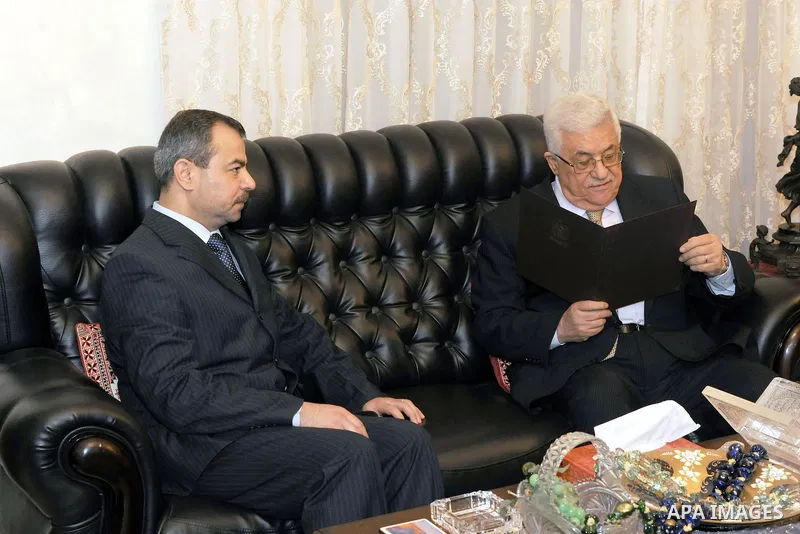 Palestinian President Mahmoud Abbas, receives an invitation from Iraqi President Jalal Talabani, to attend the Arab summit in the Jordan Capital of Amman, on Feb. 27, 2012. Photo by Thaer Ganaim
